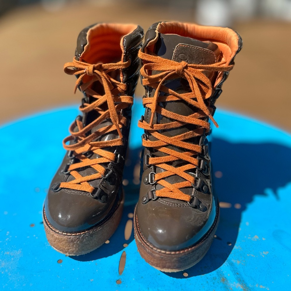 Funky wedge lace up boots. Worn only twice.
